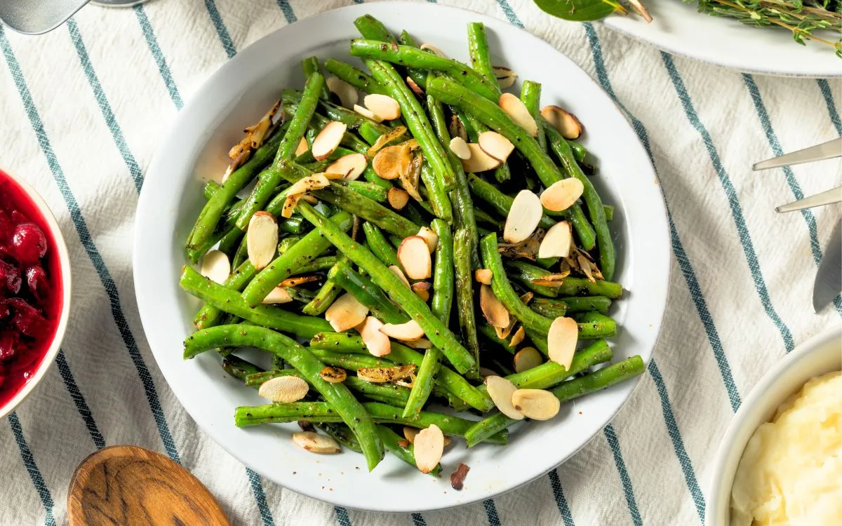 bowl of green beans with slivered almonds - gluten free sides for bbq